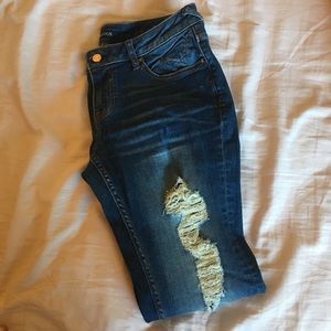 Distressed boyfriend style jeans